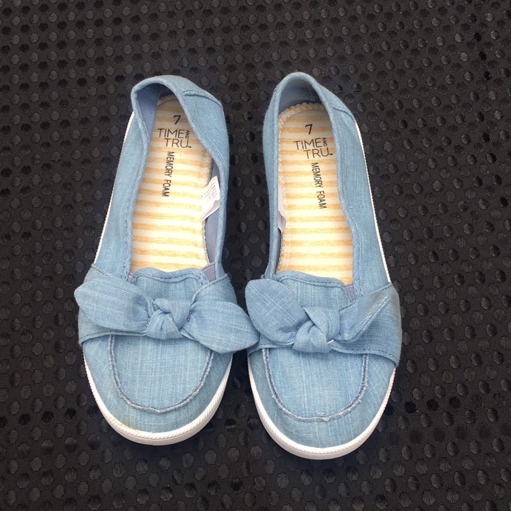 Blue slip on flats with bow size 7